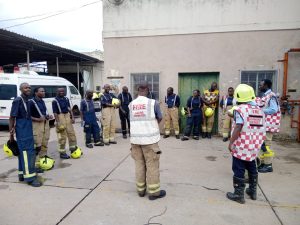 Introduction to Incident Management students practicing debrief skills